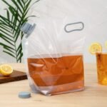 Restaurantware Cater Tek 1 Gallon Water Containers 10 Drink Bags - Collapsible Includes Tamper-Evident Caps Clear Plastic Beverage Bags For Catered Events Camping or Hiking Durable Handle - Image 4